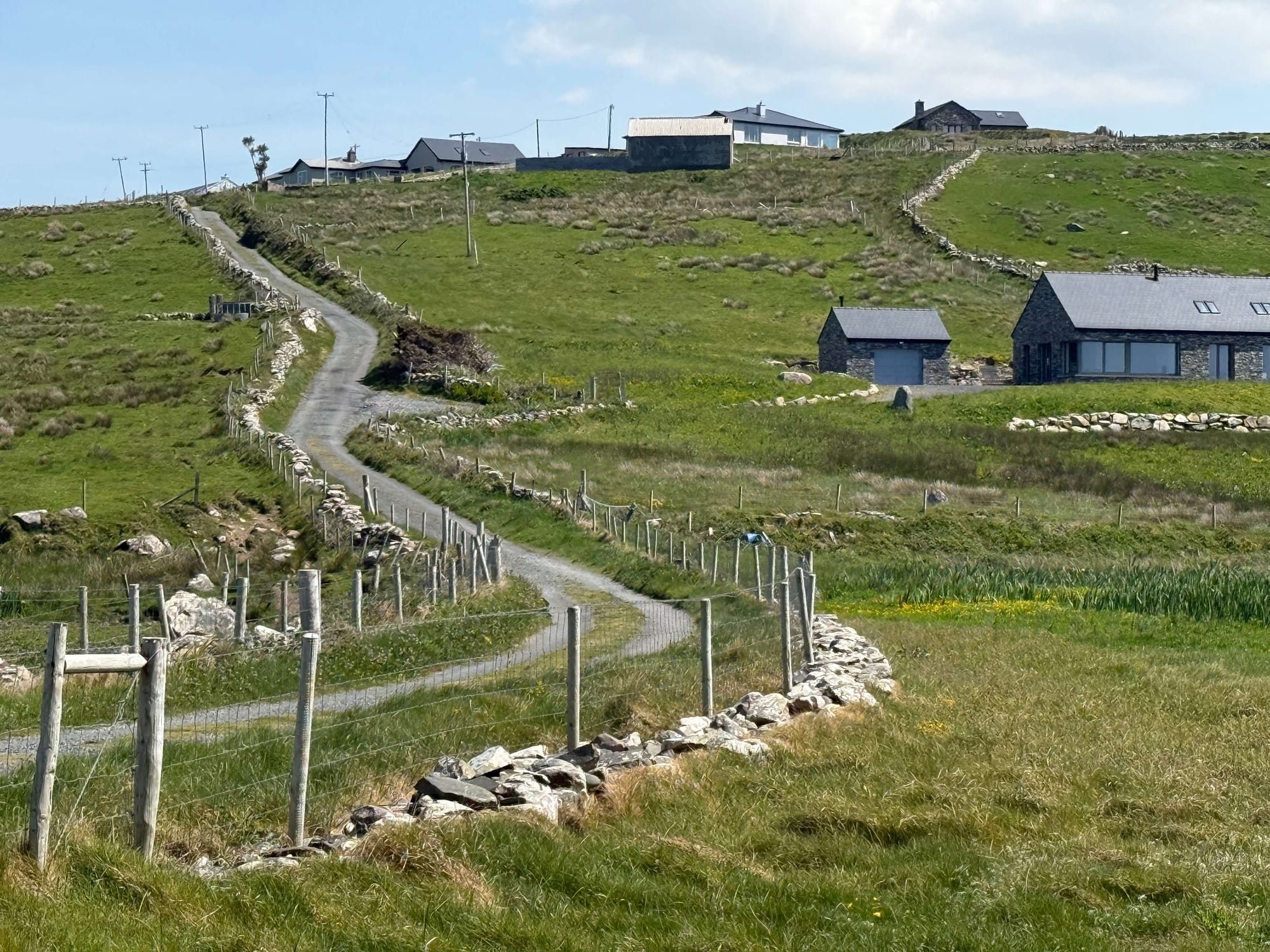 Typical narrow Irish country doad to the beach in Louisburgh, Co Mayo